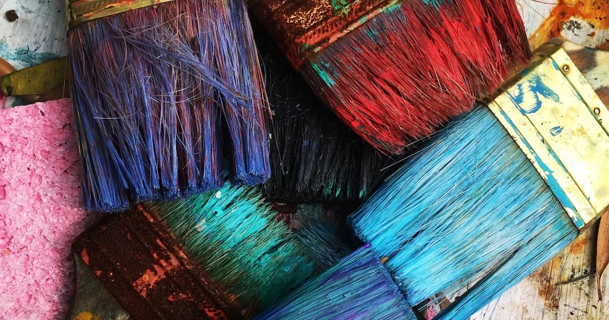 Artist's hands warming up with loose quick sketches in sketchbook