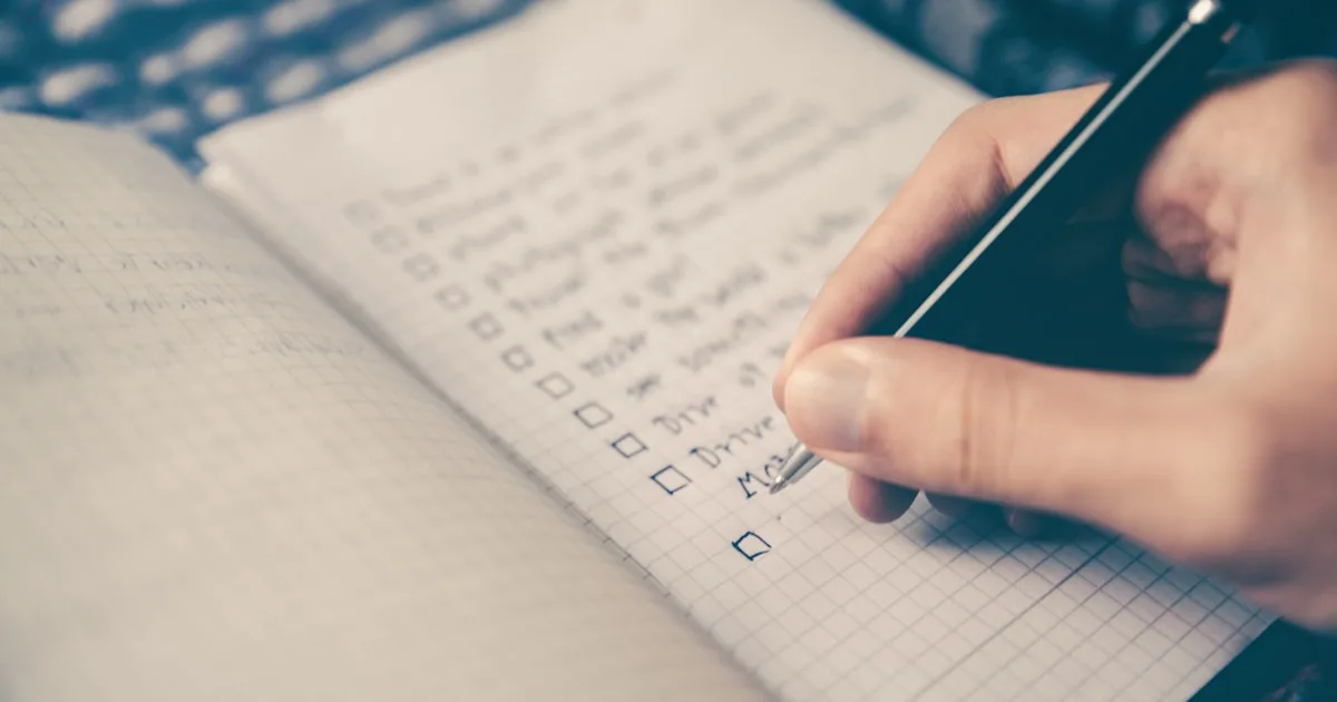 Artist's notebook with quarterly goals written out for skill development
